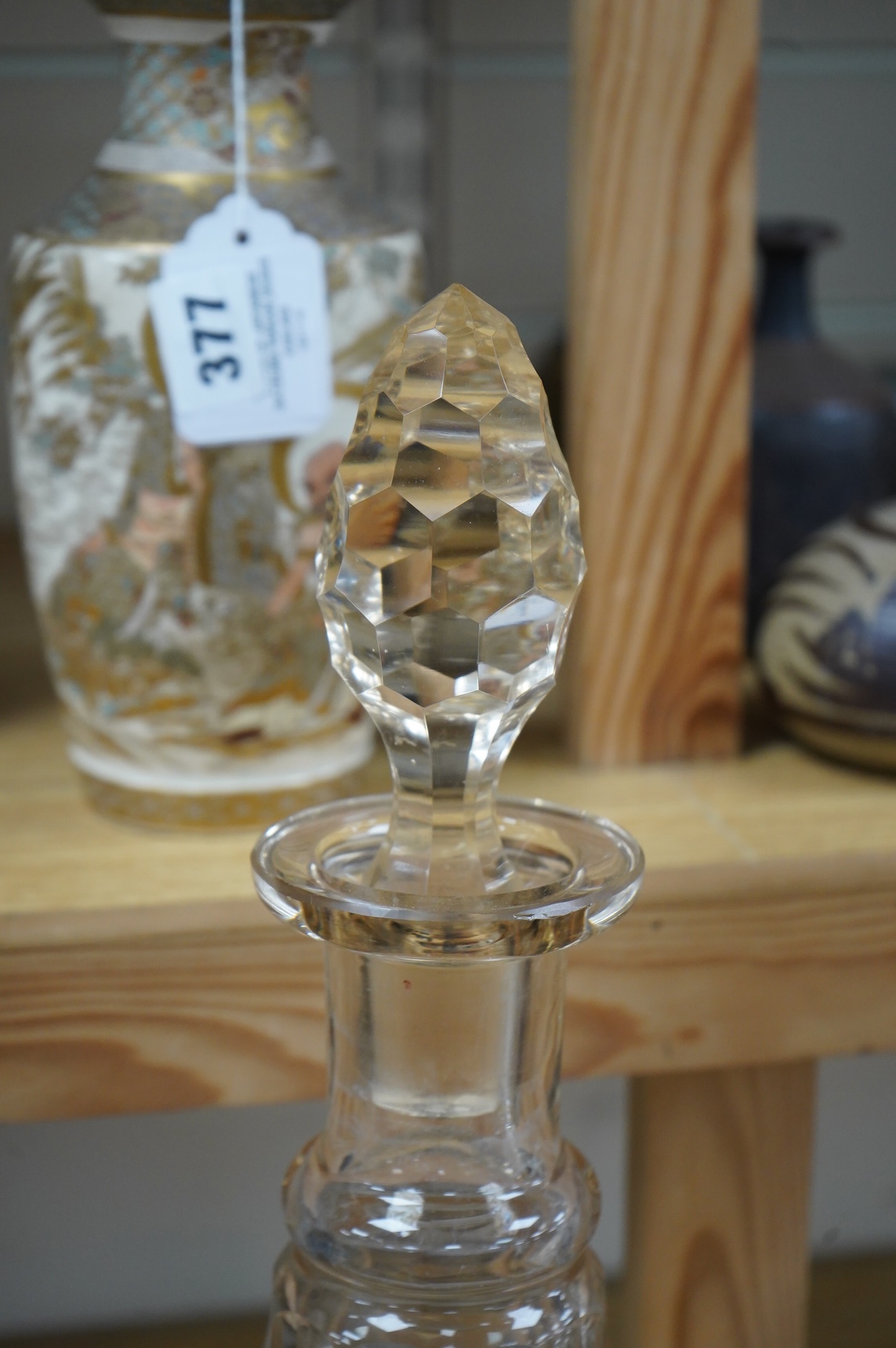 A pair of Victorian clear glass chemist display bottles and stoppers, 63cm high